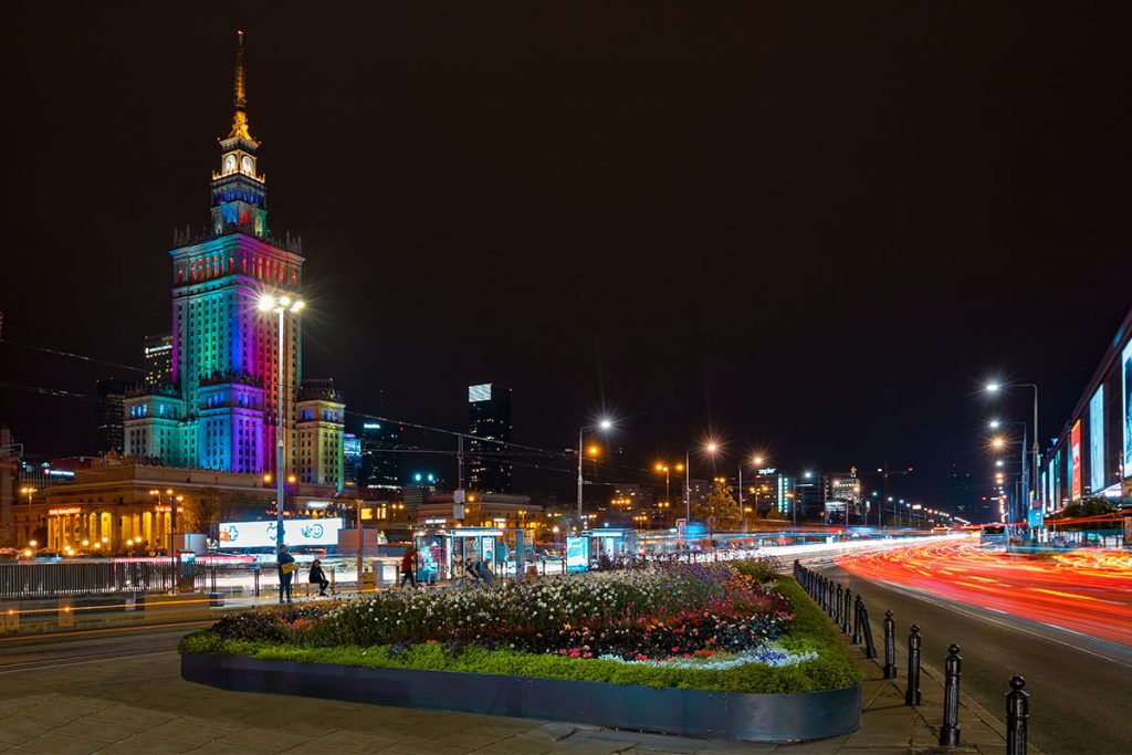 The modern city of Warsaw at night_Photo by Adam Nieścioruk on Unsplash